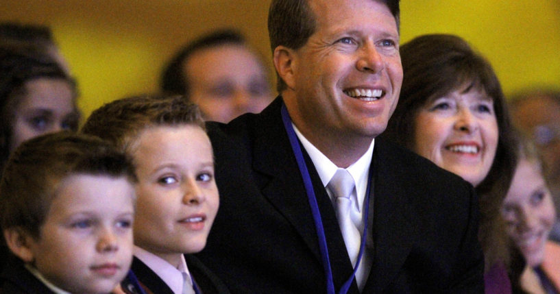 Jim Bob Duggar and his family listen as former Arkansas Gov. Mike Huckabee speaks to the Values Voter Summit on Sept. 17, 2010, in Washington.