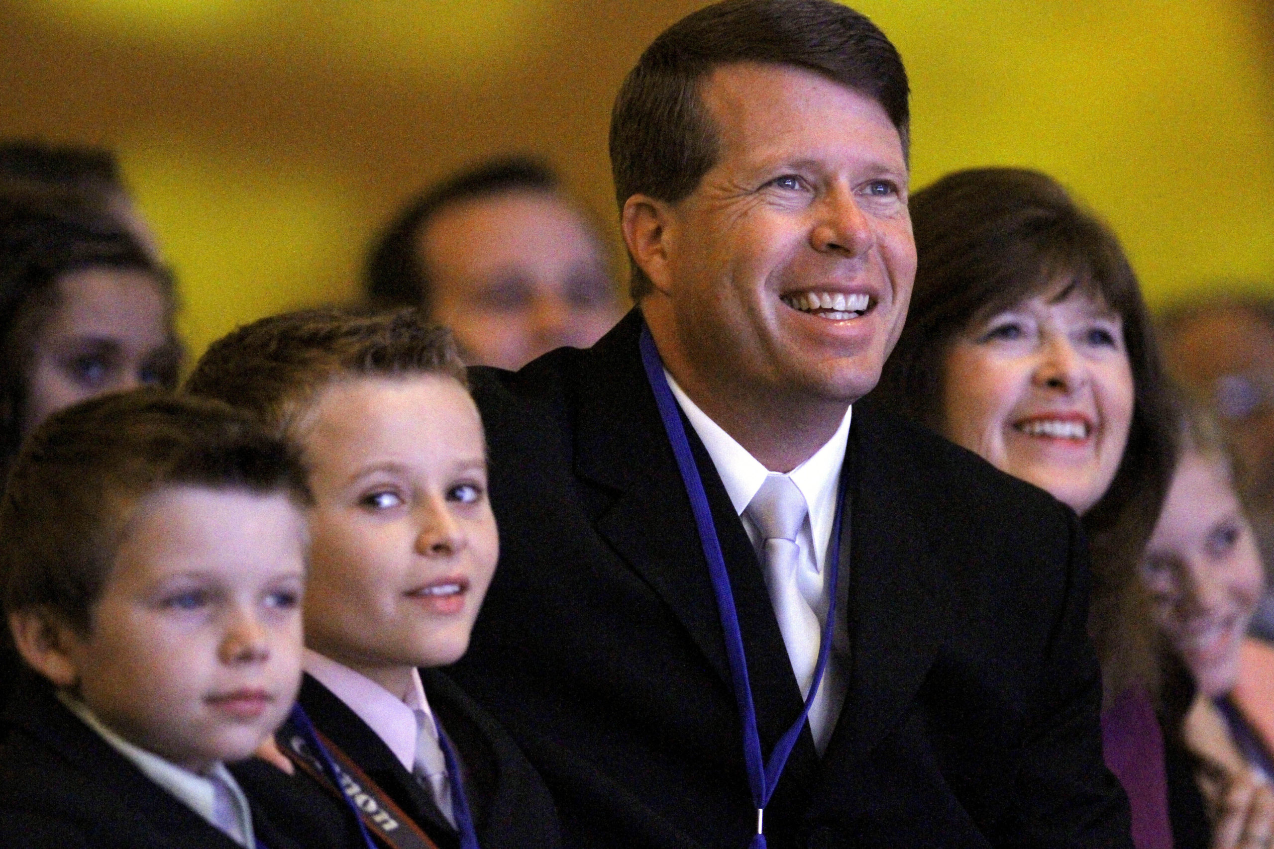 Jim Bob Duggar and his family listen as former Arkansas Gov. Mike Huckabee speaks to the Values Voter Summit on Sept. 17, 2010, in Washington.