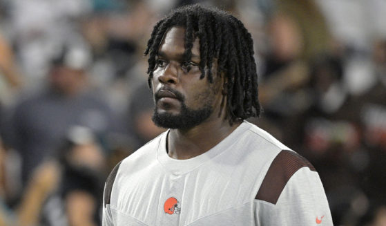 Malik McDowell is seen in this file photo taken at an NFL preseason football game in August. The Cleveland Browns defensive tackle has been arrested on charges of public exposure and battery on a sheriff's deputy in South Florida.