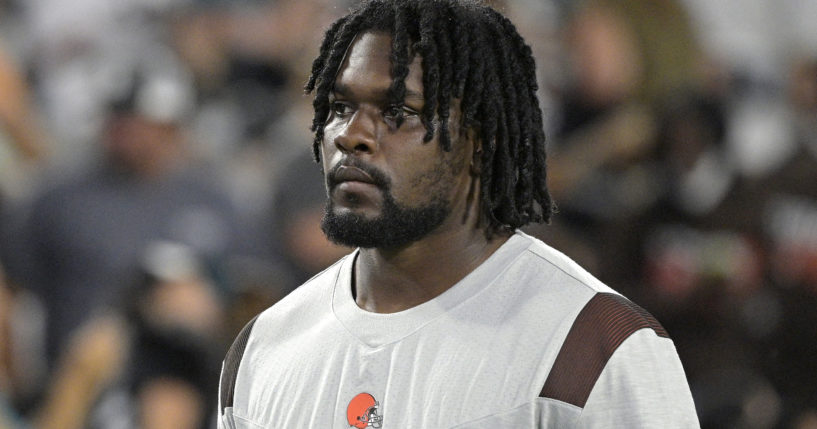 Malik McDowell is seen in this file photo taken at an NFL preseason football game in August. The Cleveland Browns defensive tackle has been arrested on charges of public exposure and battery on a sheriff's deputy in South Florida.