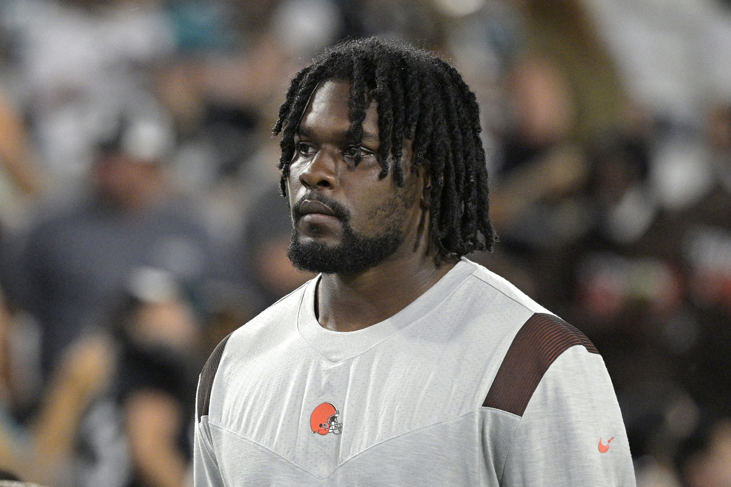 Malik McDowell is seen in this file photo taken at an NFL preseason football game in August. The Cleveland Browns defensive tackle has been arrested on charges of public exposure and battery on a sheriff's deputy in South Florida.