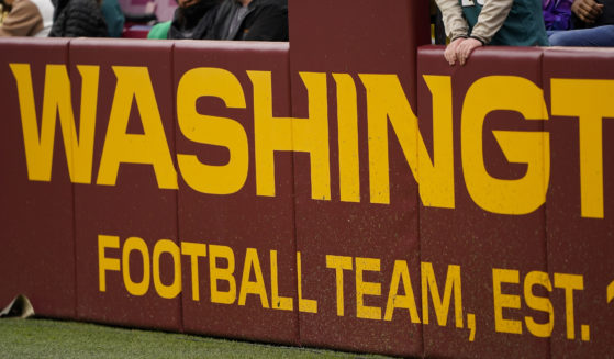 The end zone is labeled with the name of the Washington Football Team during the second half of an NFL football game against the Philadelphia Eagles, Jan. 2, 2022, in Landover, Maryland.