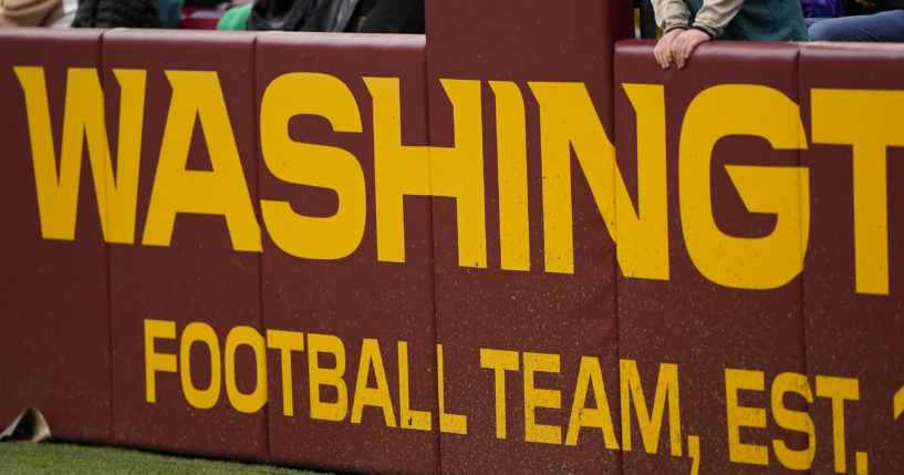 The end zone is labeled with the name of the Washington Football Team during the second half of an NFL football game against the Philadelphia Eagles, Jan. 2, 2022, in Landover, Maryland.