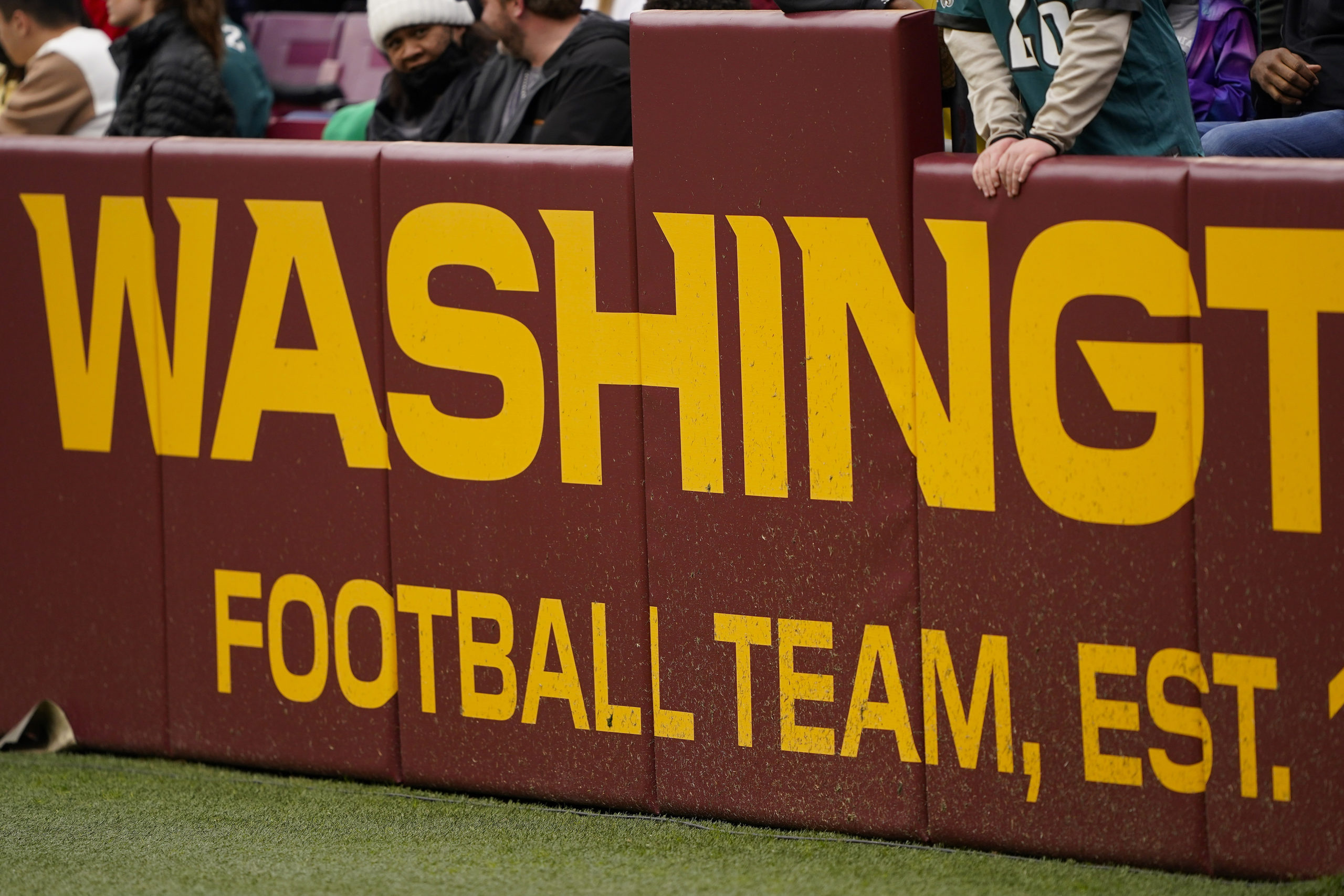 The end zone is labeled with the name of the Washington Football Team during the second half of an NFL football game against the Philadelphia Eagles, Jan. 2, 2022, in Landover, Maryland.