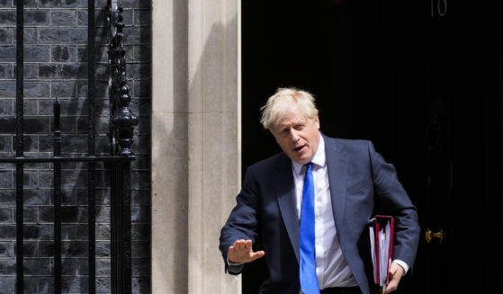 British Prime Minister Boris Johnson leaves 10 Downing Street in London Wednesday. Johnson stepped down as head of the Conservative Party Thursday after his government was rocked by the resignation of 50 top ministers.