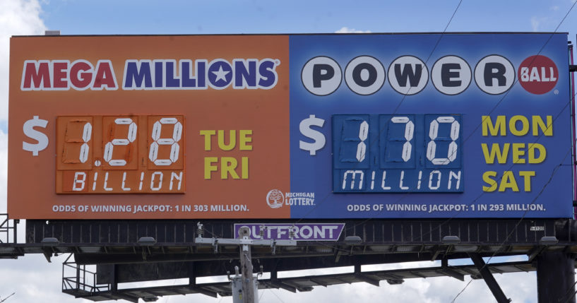 A sign displays the Mega Millions lottery jackpot Friday in Detroit.