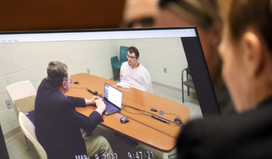 Marjory Stoneman Douglas High School shooter Nikolas Cruz is shown on a courtroom monitor during a videotaped interview with clinical neuropsychologist Dr. Robert Denney in Fort Lauderdale, Florida, on Thursday.