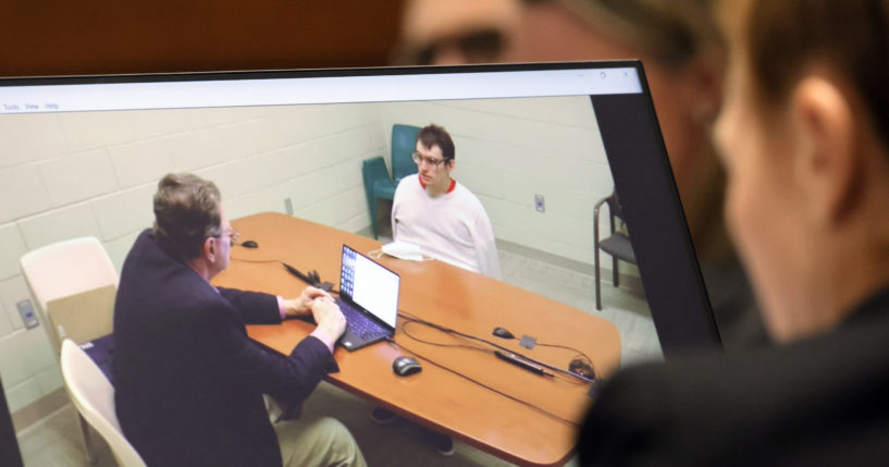 Marjory Stoneman Douglas High School shooter Nikolas Cruz is shown on a courtroom monitor during a videotaped interview with clinical neuropsychologist Dr. Robert Denney in Fort Lauderdale, Florida, on Thursday.