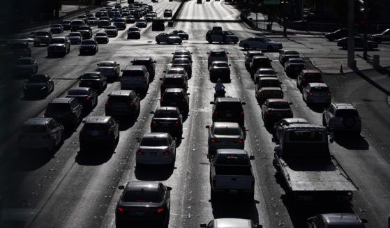 Cars wait at a red light during rush hour on the Las Vegas Strip in Las Vegas, Nevada on April 22, 2021.