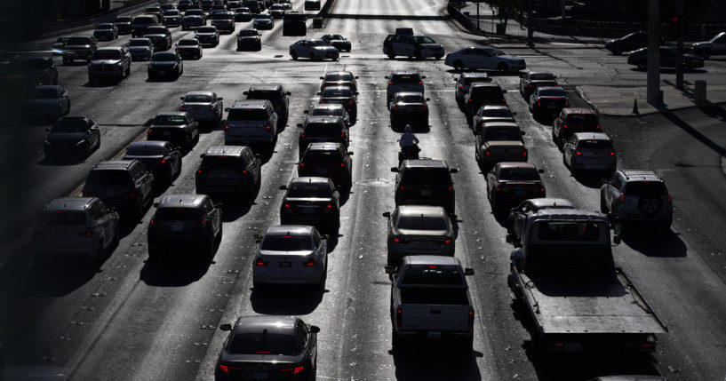 Cars wait at a red light during rush hour on the Las Vegas Strip in Las Vegas, Nevada on April 22, 2021.