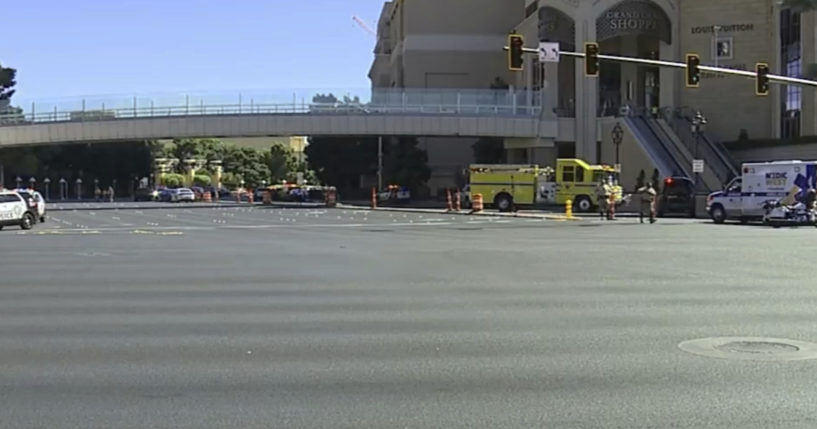 Emergency personnel respond to the scene of a stabbing on the Las Vegas trip on Thursday.