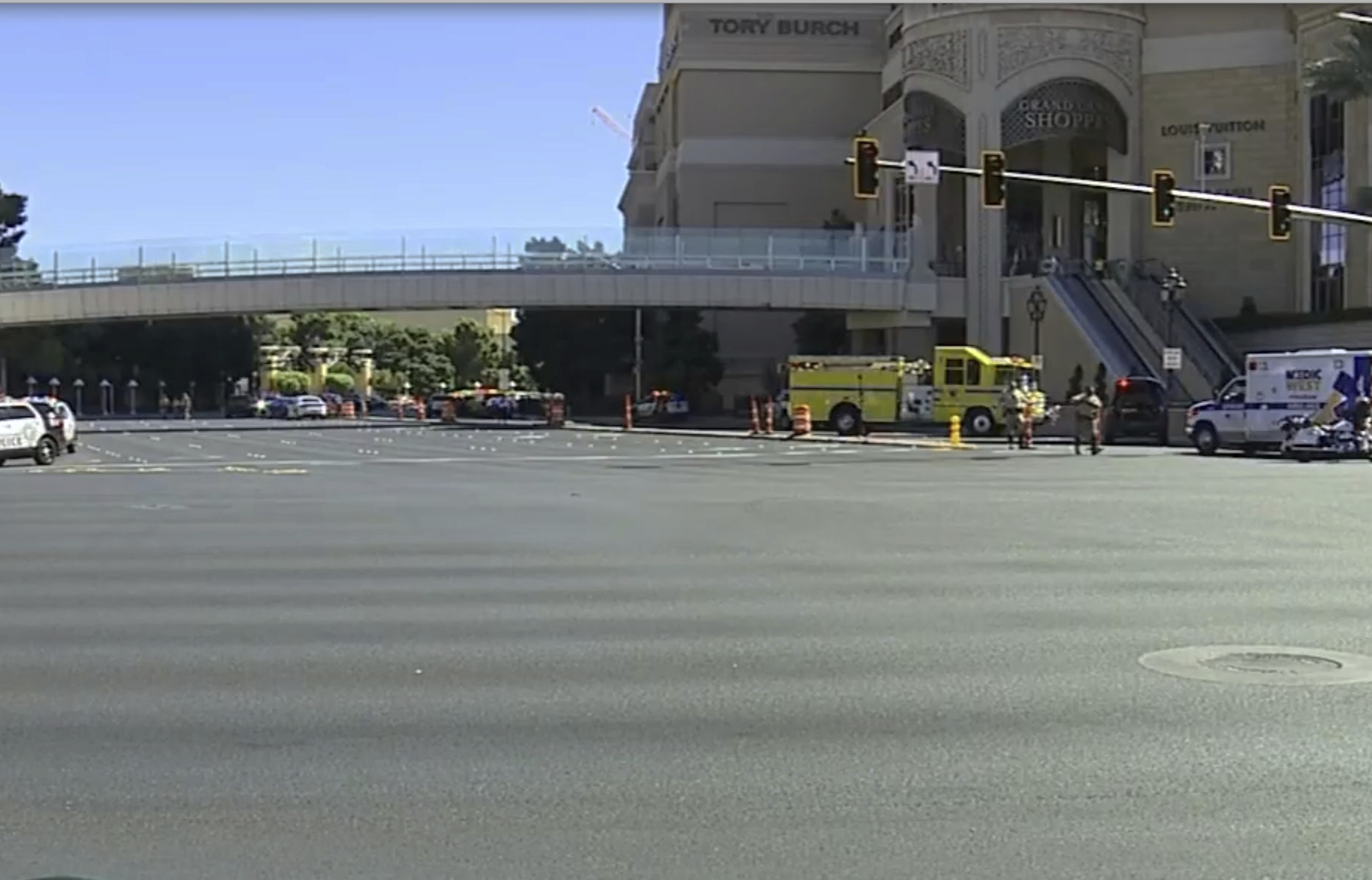 Emergency personnel respond to the scene of a stabbing on the Las Vegas trip on Thursday.