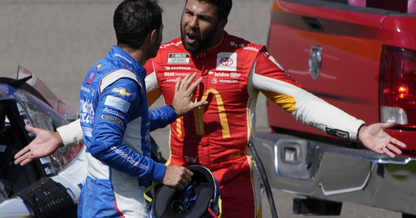 Bubba Wallace, right, argues with Kyle Larson after the two crashed during a NASCAR Cup Series auto race Oct. 16 in Las Vegas.