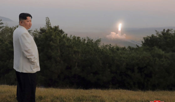 North Korean dictator Kim Jong Un watches a missile test in a photo released Monday.