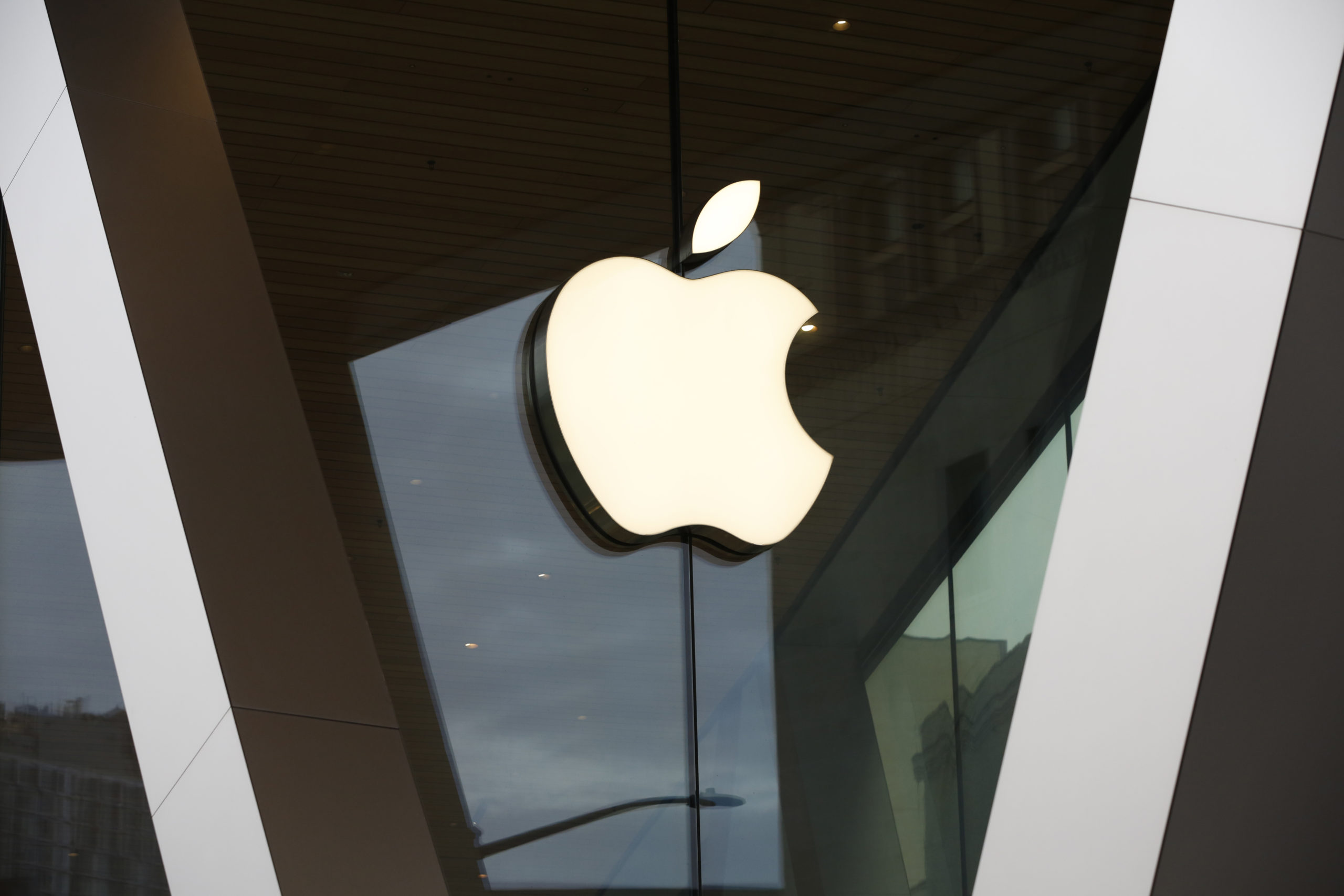 An Apple logo adorns the facade of the downtown Brooklyn Apple store in New York City, on March 14, 2020.