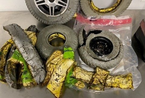 A photo provided by U.S. Customs and Border Protection shows cocaine seized by customs officers from a traveler who authorities say was smuggling the drugs in the wheels of her wheelchair at New York's Kennedy International Airport on Thursday.