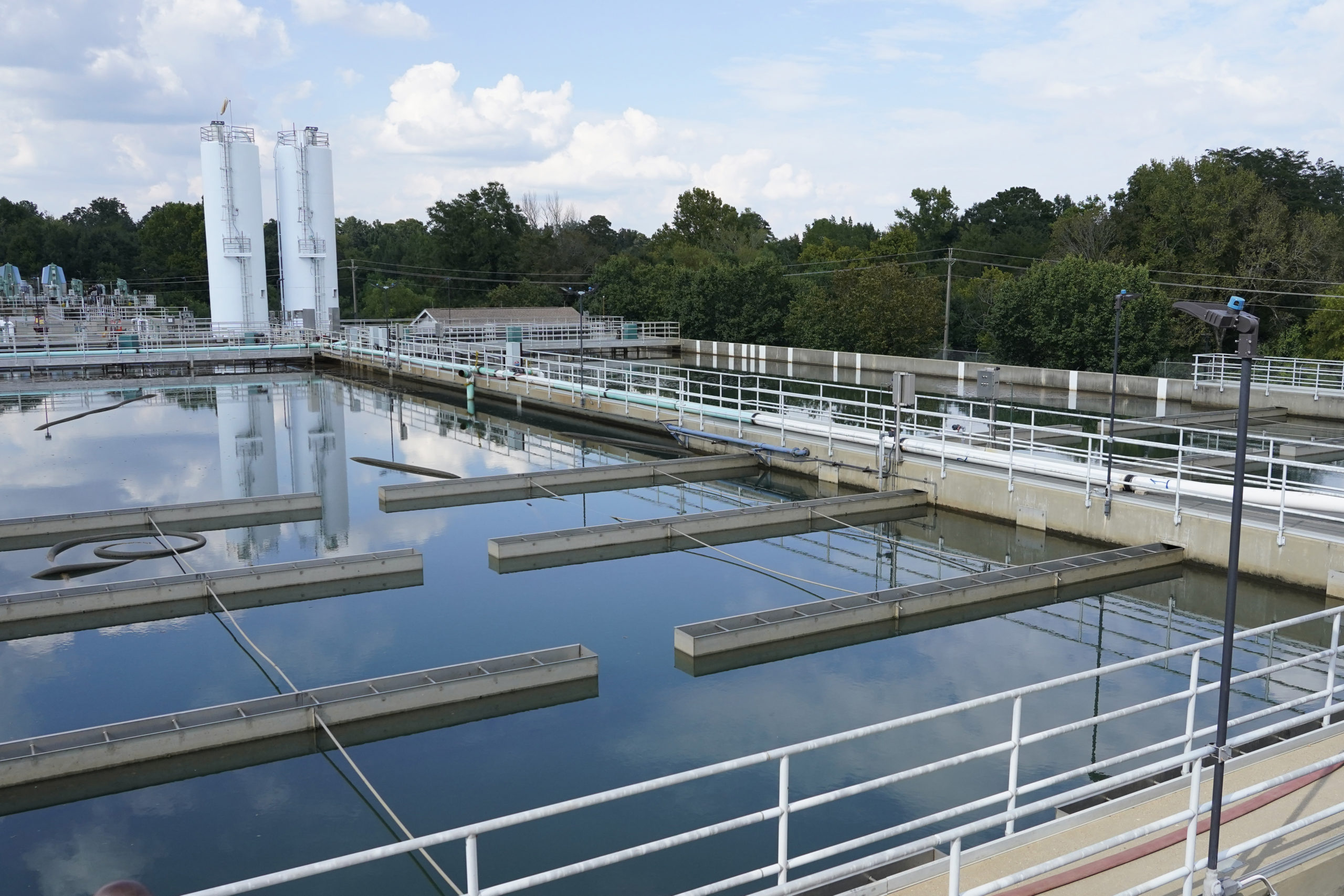 Clouds are reflected off the City of Jackson's O.B. Curtis Water Treatment Facility's sedimentation basins in Ridgeland, Mississippi, on Sept. 2.