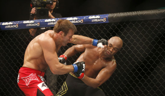 Anderson Silva, right, of Brazil, fights Stephan Bonnar, of the United States, during their light heavyweight mixed martial arts bout at the Ultimate Fighting Championship (UFC) 153 in Rio de Janeiro, Oct. 14, 2012.