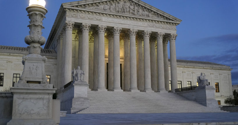 Light illuminates part of the Supreme Court building at dusk on Capitol Hill in Washington, D.C., on Nov. 16.