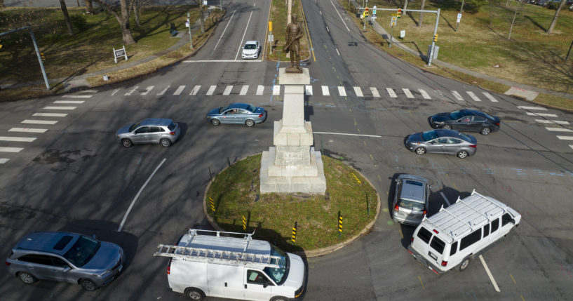 Traffic drives in the circle at the monument of confederate General A.P. Hill, which contains his remains, is in the middle of a traffic circle on Arthur Ashe Blvd. on Jan. 6 in Richmond, Virginia.