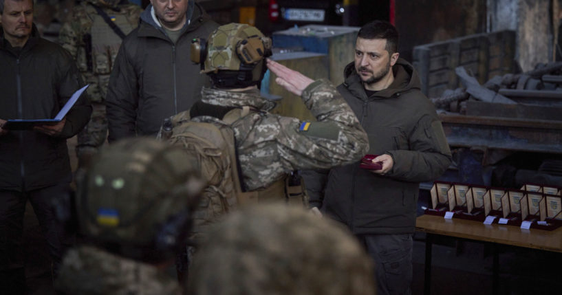 Ukrainian President Volodymyr Zelenskyy, right, awards a serviceman at the site of the heaviest battles with the Russian invaders in Bakhmut, Ukraine, on Tuesday.