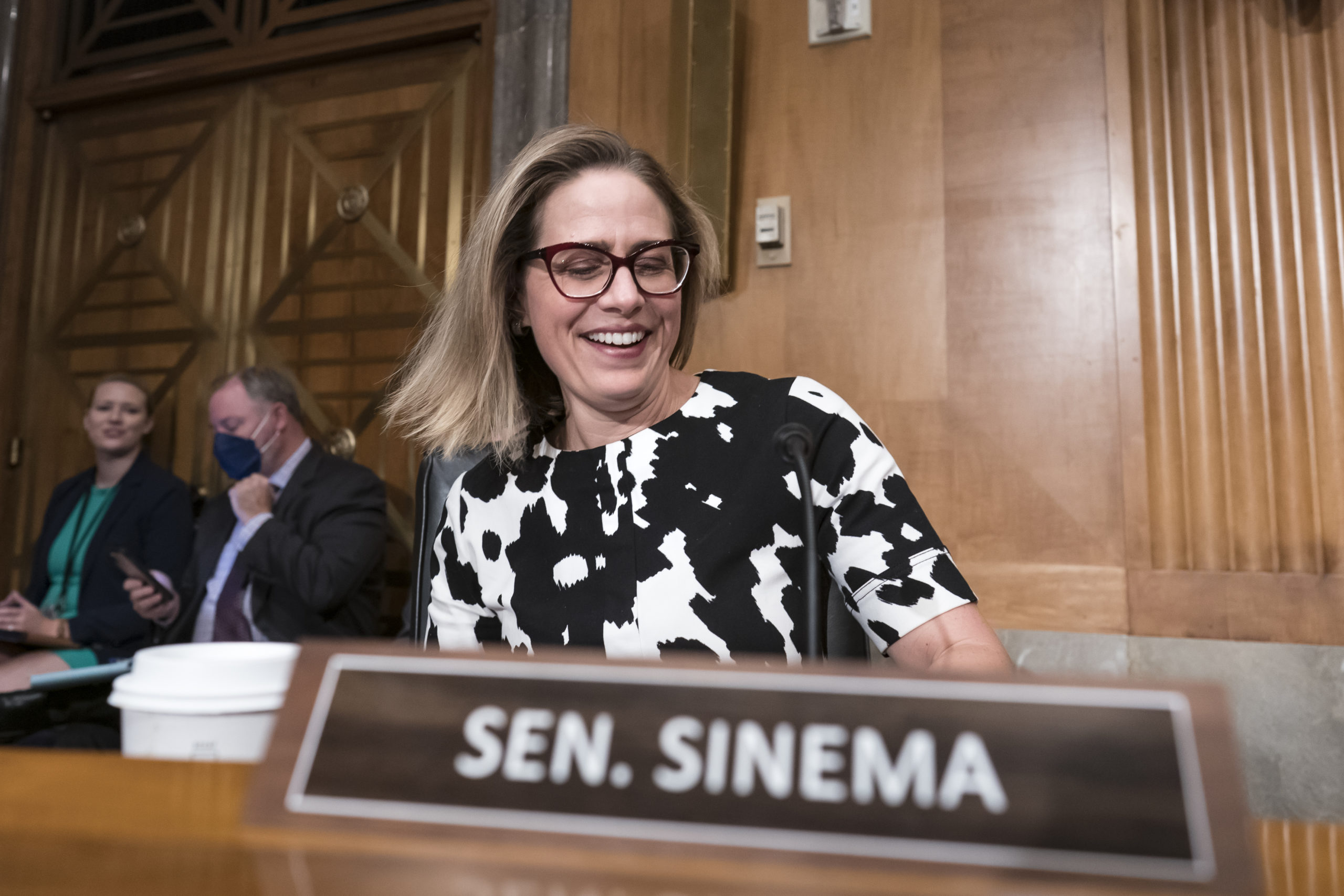 Sen. Kyrsten Sinema arrives for a meeting of the Senate Homeland Security Committee at the Capitol on Aug. 3. Sinema was a Democrat then, but she left the party on Friday.