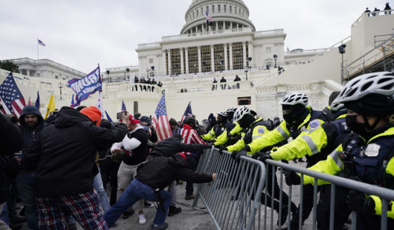 Capitol Police battle rioters outside the Capitol on Jan. 6, 2021.