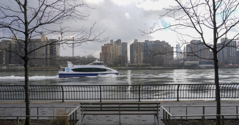 A commuter ferry travels down the East River on the Upper East Side of the Manhattan borough of New York City on Jan. 6. Woolly mammoth bones allegedly were dumped in the river in the 1940s.