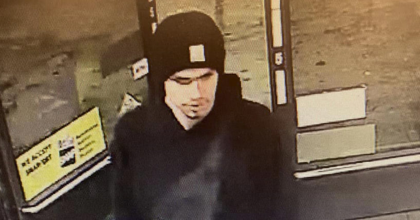 A suspect sought in a shooting at a convenience store in Yakima, Washington, is seen on surveillance footage early on Tuesday.