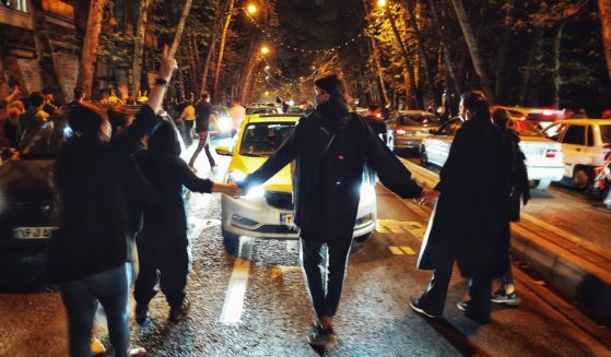 Women on Oct. 1 protest the September death of 22-year-old Mahsa Amini, who had been detained by the morality police in Tehran, Iran.