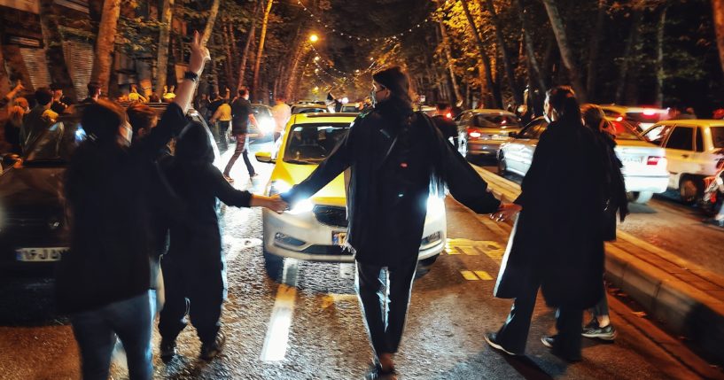 Women on Oct. 1 protest the September death of 22-year-old Mahsa Amini, who had been detained by the morality police in Tehran, Iran.