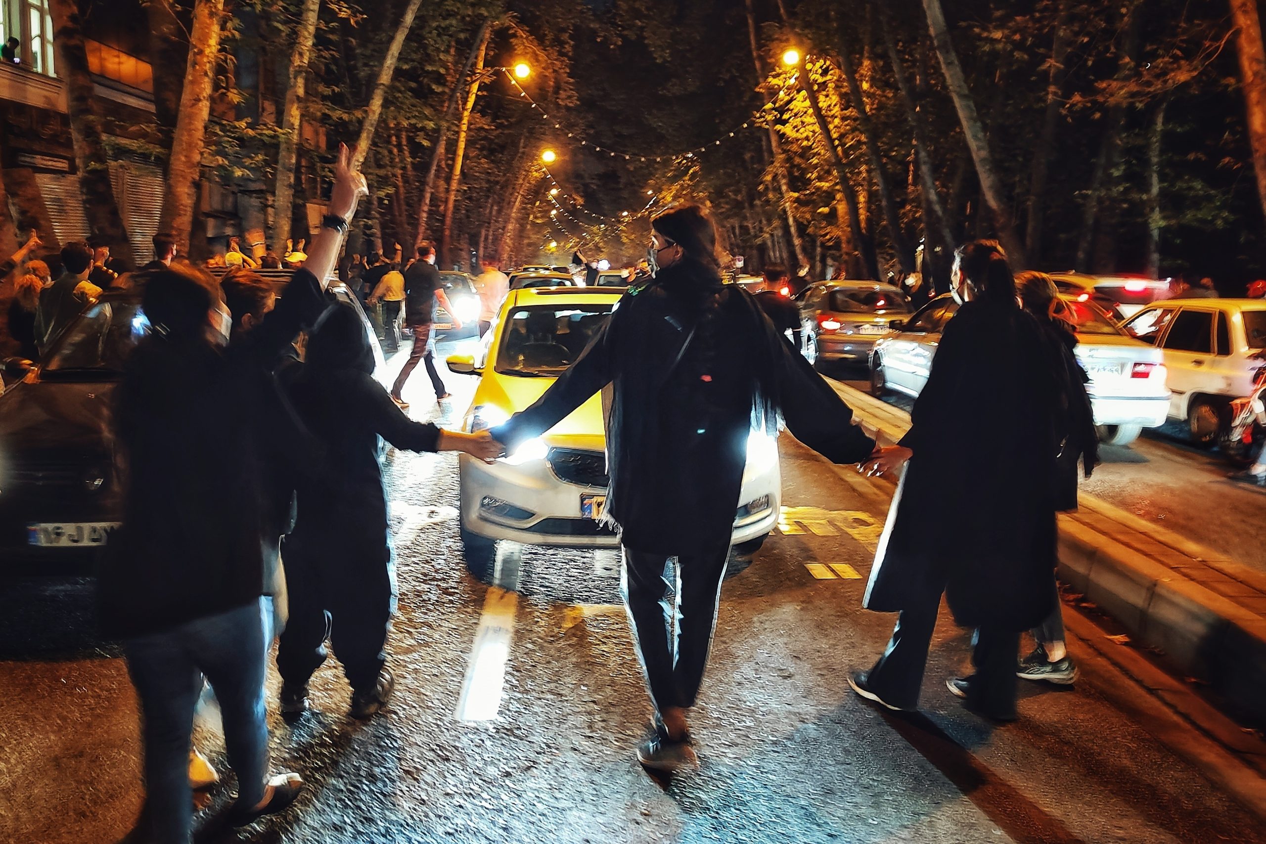 Women on Oct. 1 protest the September death of 22-year-old Mahsa Amini, who had been detained by the morality police in Tehran, Iran.