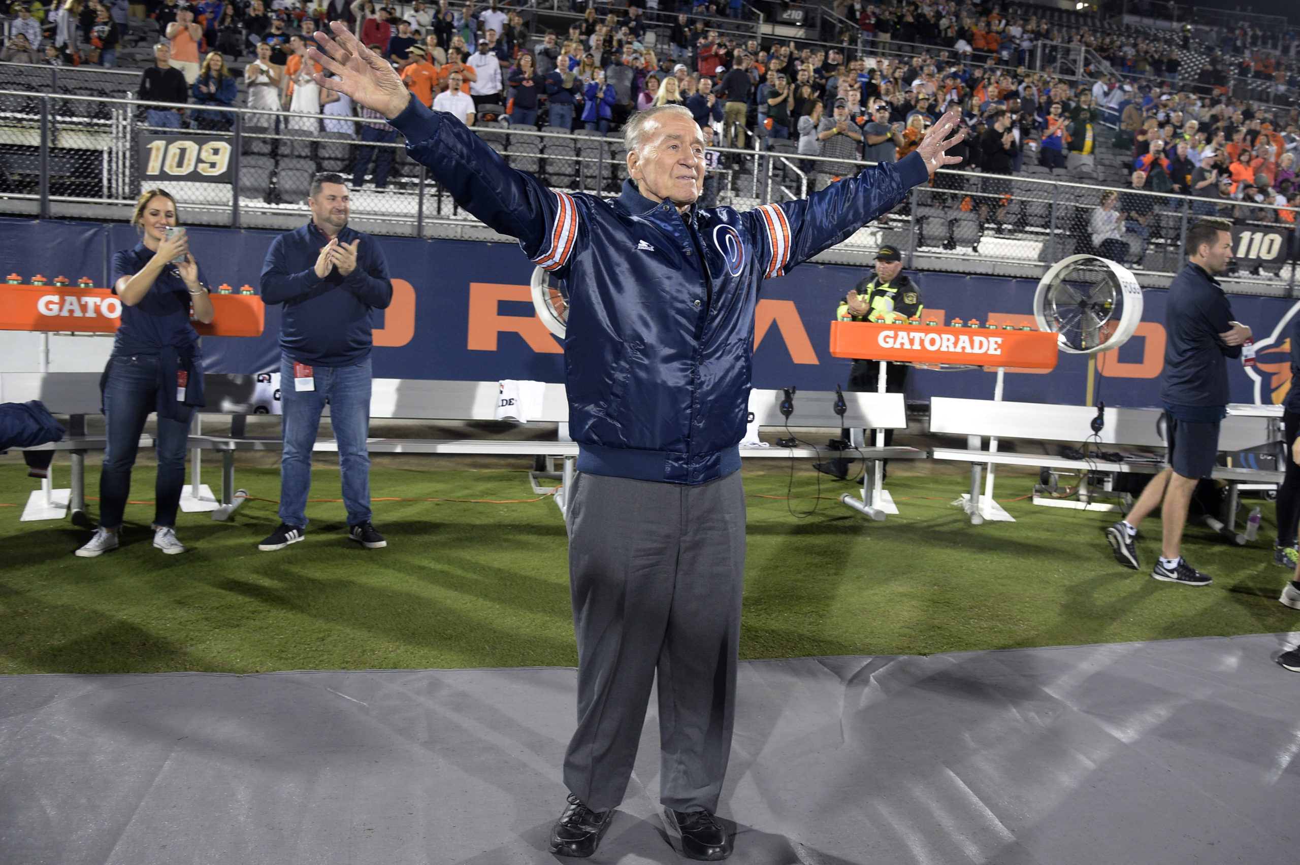 Apollo 7 astronaut Walter Cunningham, seen acknowledging the crowd before a football game in 2019, has died. Cunningham was the last surviving astronaut from the first successful crewed space mission in NASA's Apollo program.