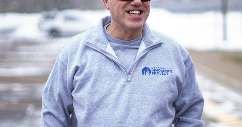 Thomas Rhodes smiles as he walks out of a Minnesota state prison in Moose Lake, Minnesota, on Friday.