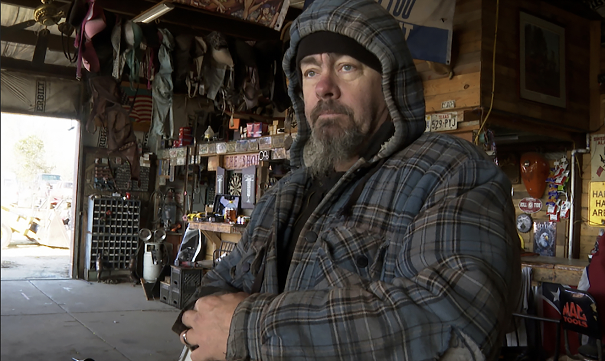 David Hollon stands inside his garage in Autauga County, Alabama on Saturday.