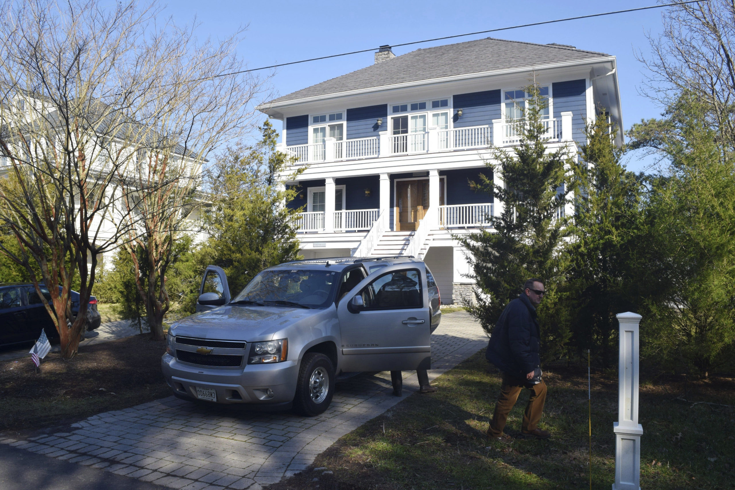 U.S. Secret Service agents are pictured in front of President Joe Biden's Rehoboth Beach, Delaware, home on Jan. 12.