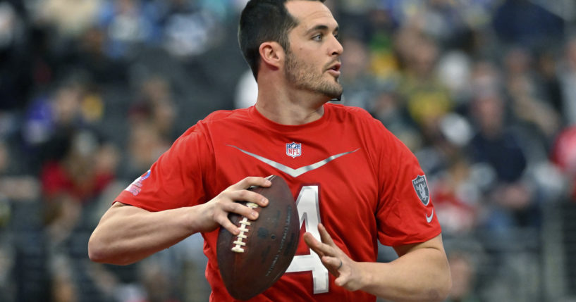 Quarterback Derek Carr looks to pass during a flag football event at the NFL Pro Bowl in Las Vegas on Feb. 5.