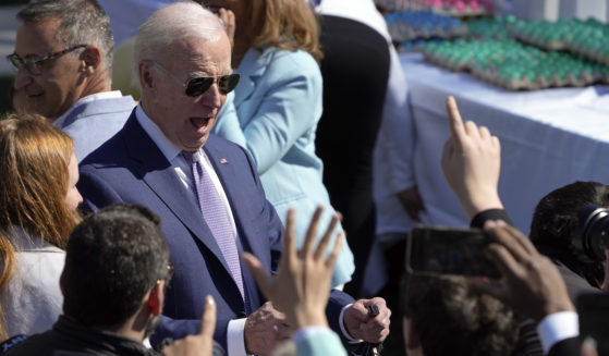 Joe Biden greets guests at the 2023 White House Easter Egg Roll