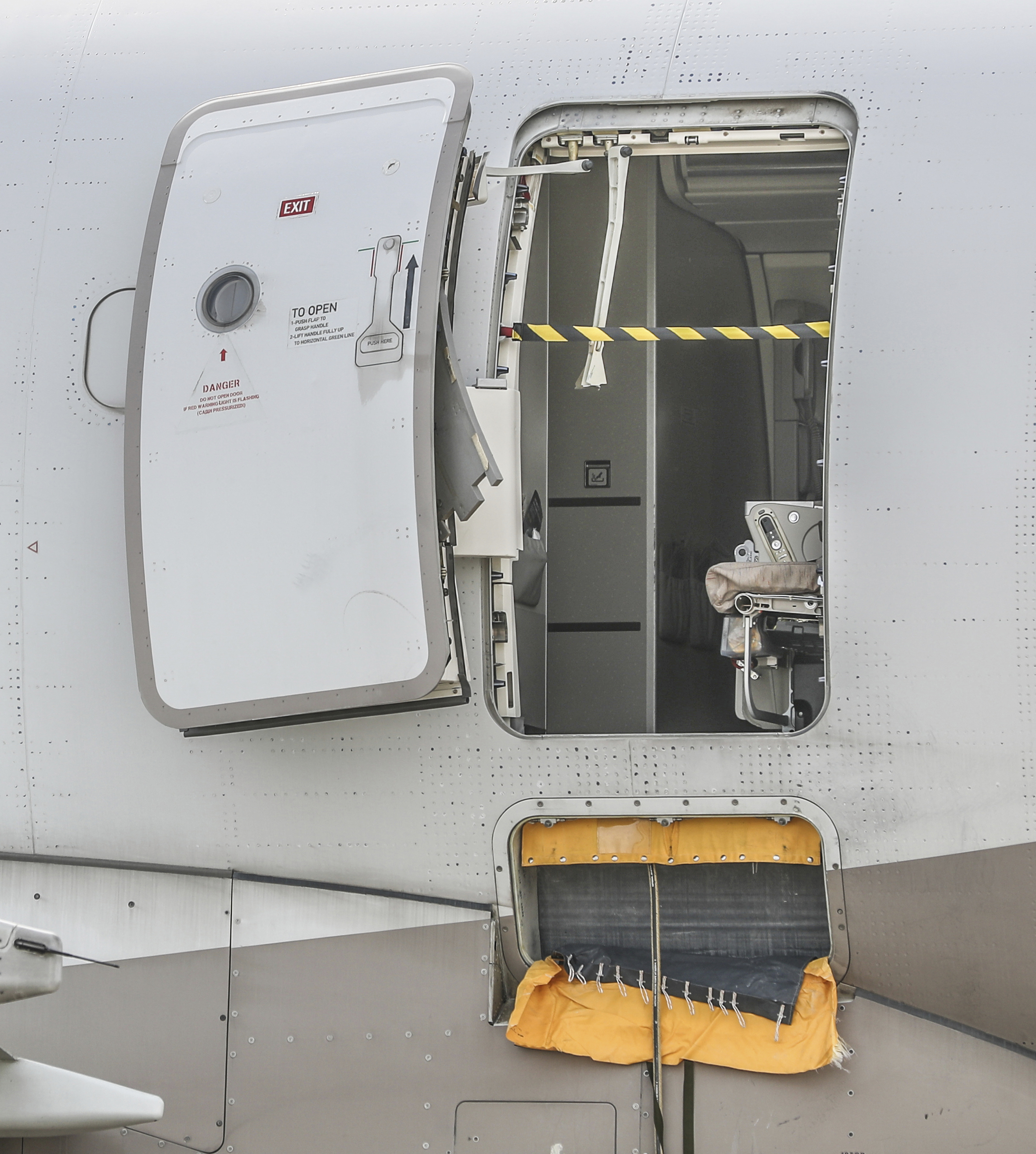 A passenger opened an emergency exit door of an Asiana Airlines flight Friday as it was descending to land in Daegu, South Korea. The plane later landed safely, airline and government officials said.