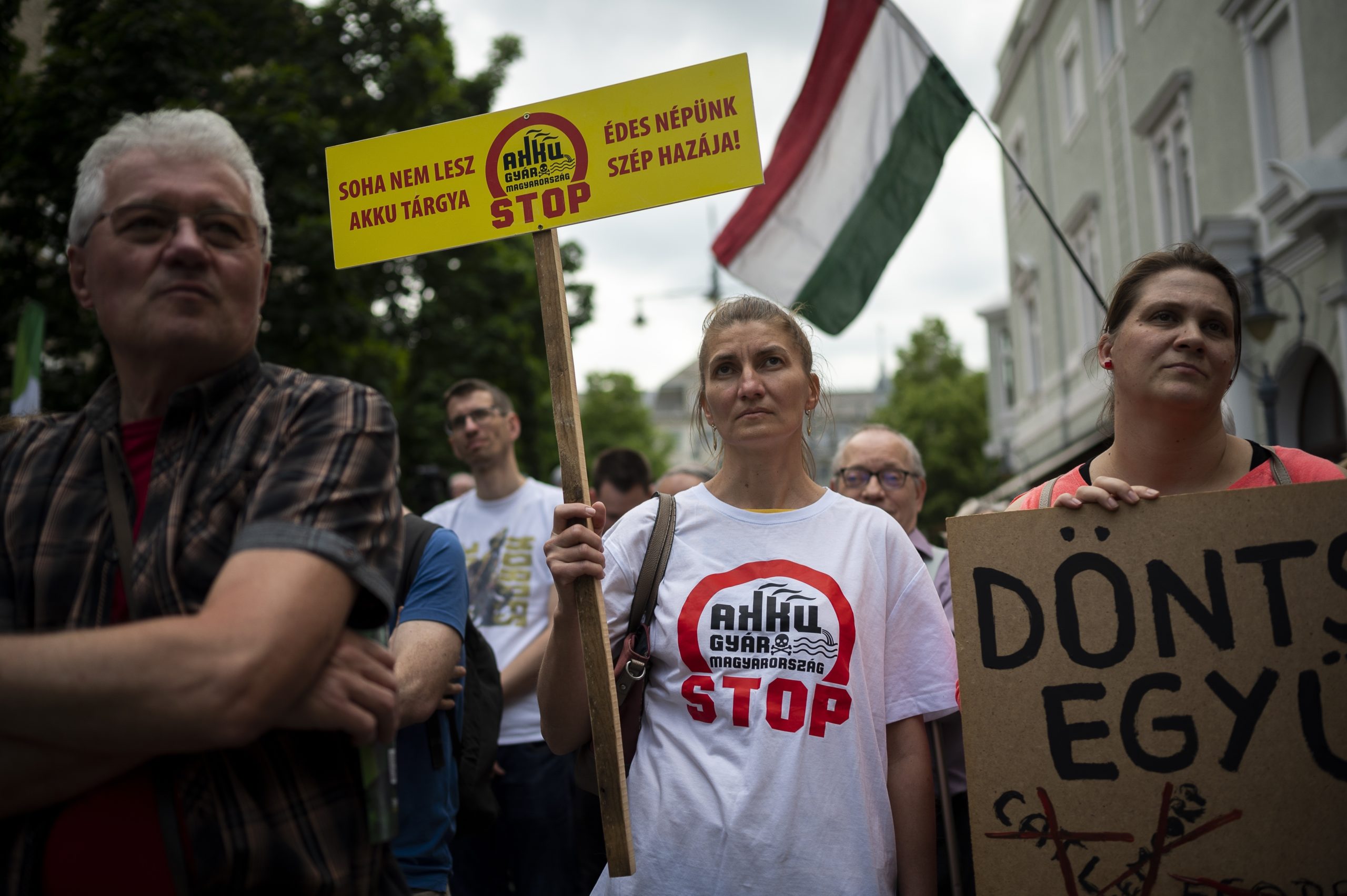 Residents gather in Debrecen, Hungary, during a demonstration against a factory that will produce batteries for electric vehicles built by a China-based company on Tuesday, May 23, 2023. (Denes Erdos / Associated Press)