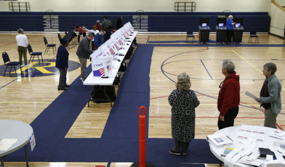 Voters fill out their ballots at a primary polling place in North Charleston, South Carolina, on Feb. 29, 2020.