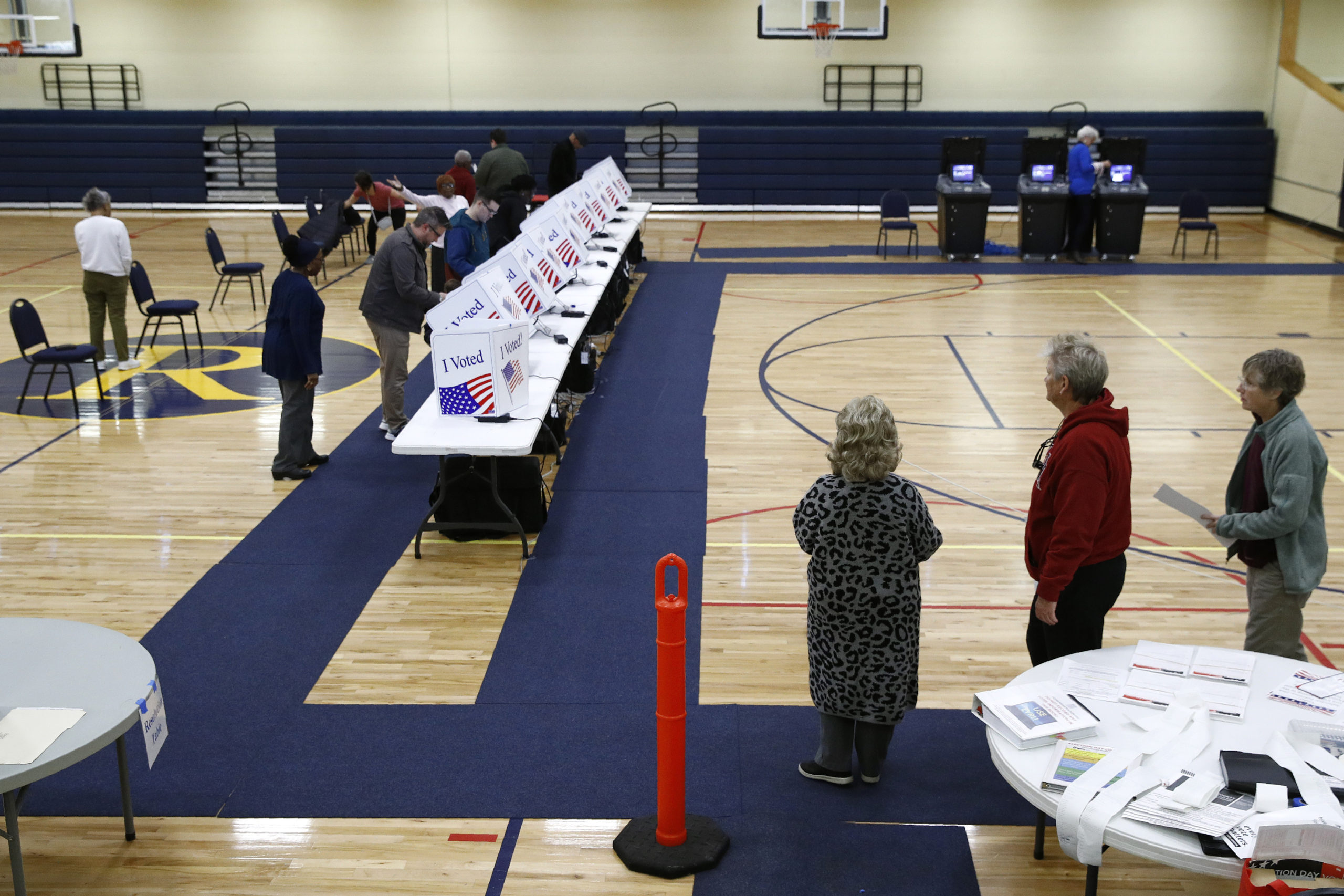 Voters fill out their ballots at a primary polling place in North Charleston, South Carolina, on Feb. 29, 2020.