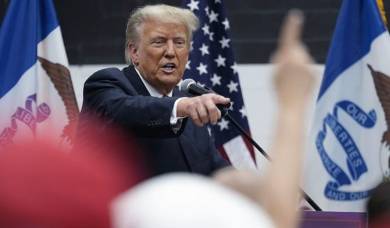 Former President Donald Trump visits with campaign volunteers at the Grimes Community Complex Park, Thursday, June 1, 2023, in Des Moines, Iowa.