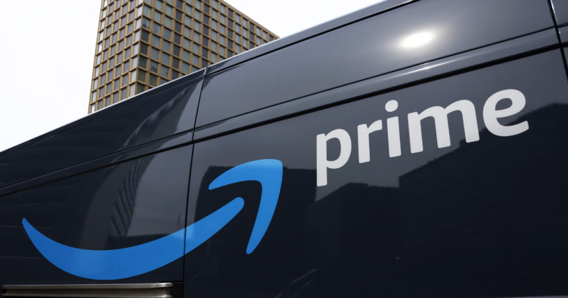 An Amazon Prime delivery vehicle is seen in downtown Pittsburgh in a file photo from March 2020. The Federal Trade Commission sued Amazon on Wednesday for what it called a years-long effort to enroll consumers without consent into its Prime program and making it difficult for them to cancel their subscriptions.