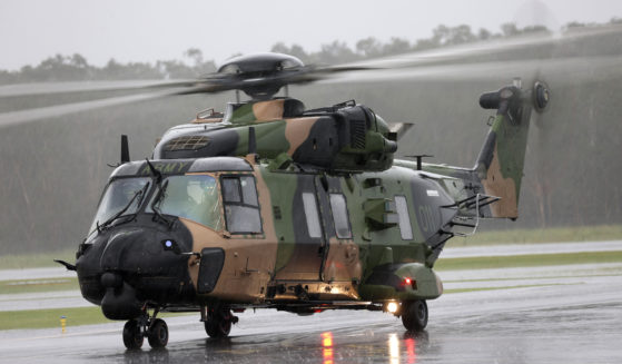 In this photo provided by the Australian Defence Force, an Australian Army MRH-90 Taipan helicopter prepares to take off from the airport in Ballina, Australia, on Feb. 27, 2022.