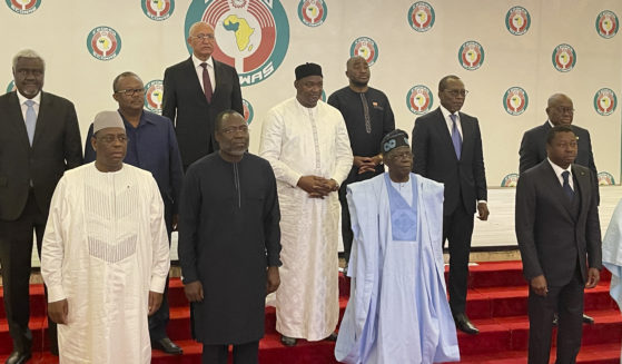 Nigeria President, Bola Ahmed Tinubu, second from left, poses , for a group photograph with other West Africa leaders after a meeting in Abuja Nigeria, Sunday, July 30, 2023. At an emergency meeting Sunday in Abuja, Nigeria, the West African bloc known as ECOWAS said that it was suspending relations with Niger, and authorized the use of force if President Mohamed Bazoum is not reinstated within a week. The African Union has issued a 15-day ultimatum to the junta in Niger to reinstall the democratically elected government.