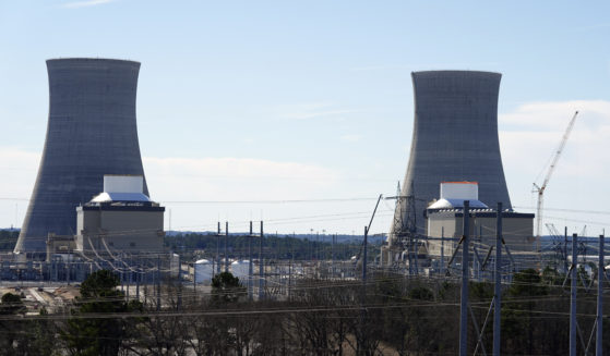 Units 3, left, and 4 and their cooling towers stand at Georgia Power Co.'s Plant Vogtle nuclear power plant, Jan. 20, 2023, in Waynesboro, Ga. (John Bazemore / AP)