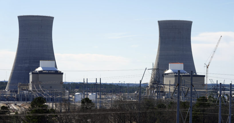 Units 3, left, and 4 and their cooling towers stand at Georgia Power Co.'s Plant Vogtle nuclear power plant, Jan. 20, 2023, in Waynesboro, Ga. (John Bazemore / AP)