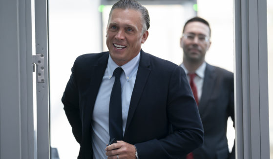 Devon Archer, Hunter Biden's former business partner, passes through the security checkpoint as he arrives on Capitol Hill to give closed-door testimony to the House Oversight Committee on Monday.