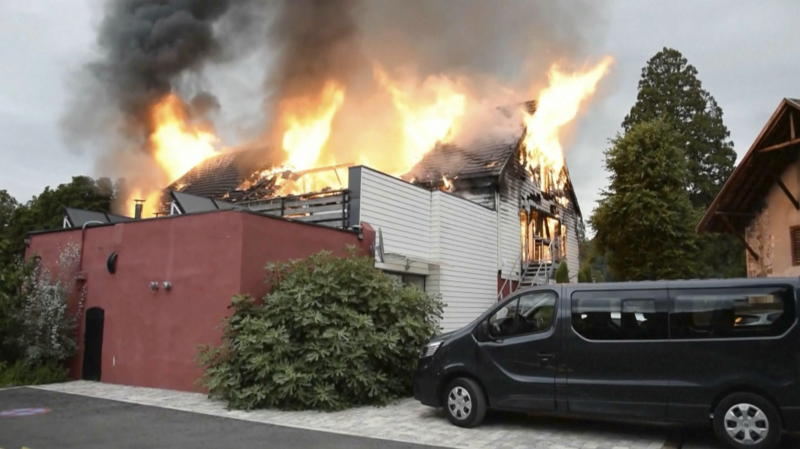 Fire rages at a vacation home in the town of Wintzenheim, north-eastern France, Wednesday Aug. 9, 2023. A fire ripped through a vacation home for adults with disabilities in eastern France on Wednesday, killing several people, the head of rescue operations said. (TNN / AP)